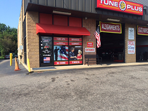Tune Up Plus storefront with American flag